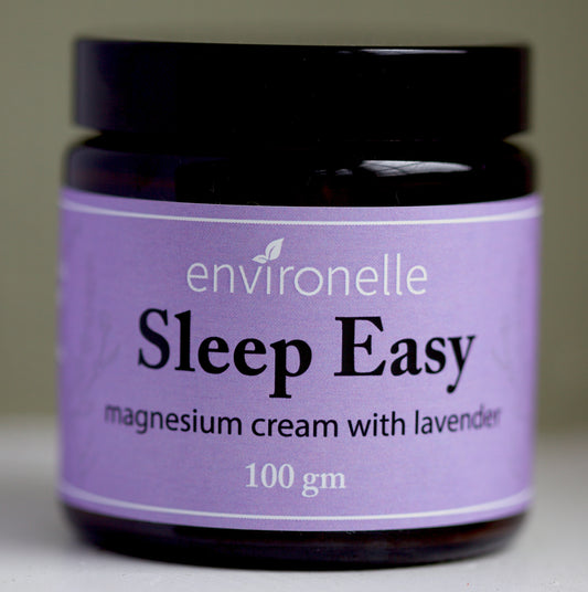 Jar of Environelle Sleep Easy magnesium cream with lavender on a neutral background